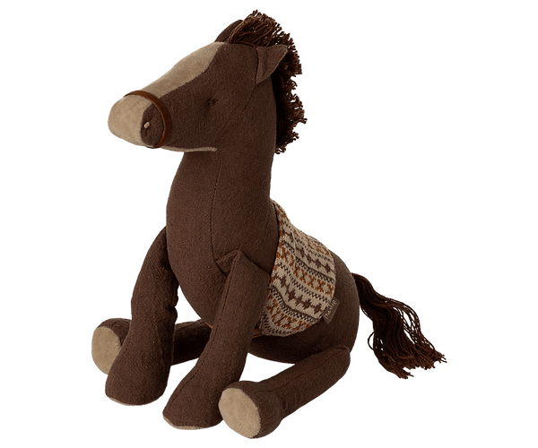 Cute brown Maileg Pony Medium made of soft corduroy with a saddle, perfect for kids from birth, 21cm tall.