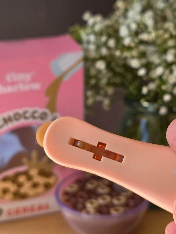 Tiny Harlow Tiny Tiny Choco Loops Cereal Bowl with choco loops and chocolate milk, perfect for doll play.