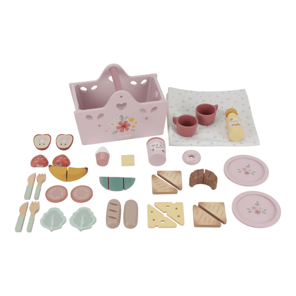 Colorful 31-piece Little Dutch wooden picnic set for imaginative outdoor play with a pink basket, plates, and food items.