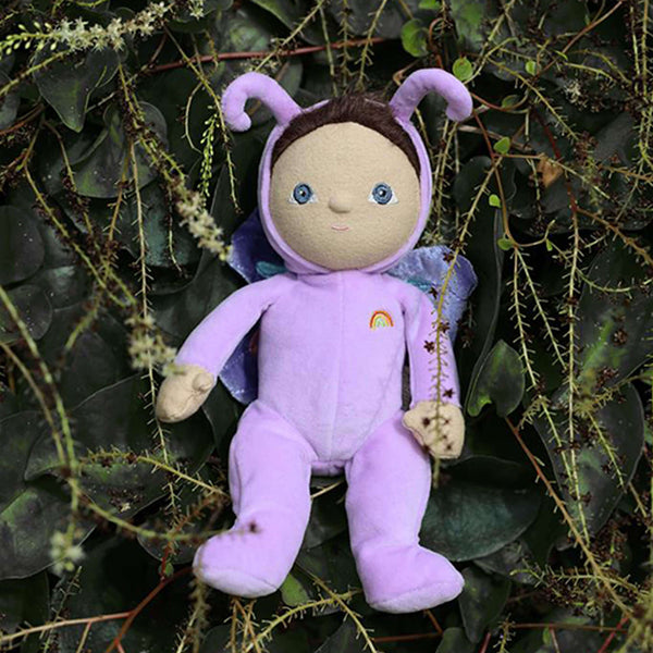 Olli Ella Dinky Dinkum Doll Betty Butterfly with purple wings on greenery.