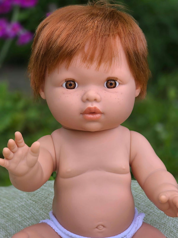 Mini Colettos, Jasper (Boy Doll with Brown Eyes & Red Hair) waving with brown eyes and red hair.