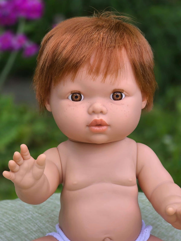 Mini Colettos, Jasper (Boy Doll with Brown Eyes & Red Hair) showing curious expression and cute pose.
