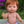 Mini Colettos, Jasper (Boy Doll with Brown Eyes & Red Hair) greeting with his hand, showcasing his cheerful expression.