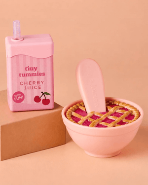 Tiny Harlow, Tiny Tummies Cherry Pie Bowl & Cherry Juice Box Set displayed with pie and juice box.