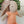 Load image into Gallery viewer, Maileg, Micro Bunny in Knitted Outfit (Orange)
